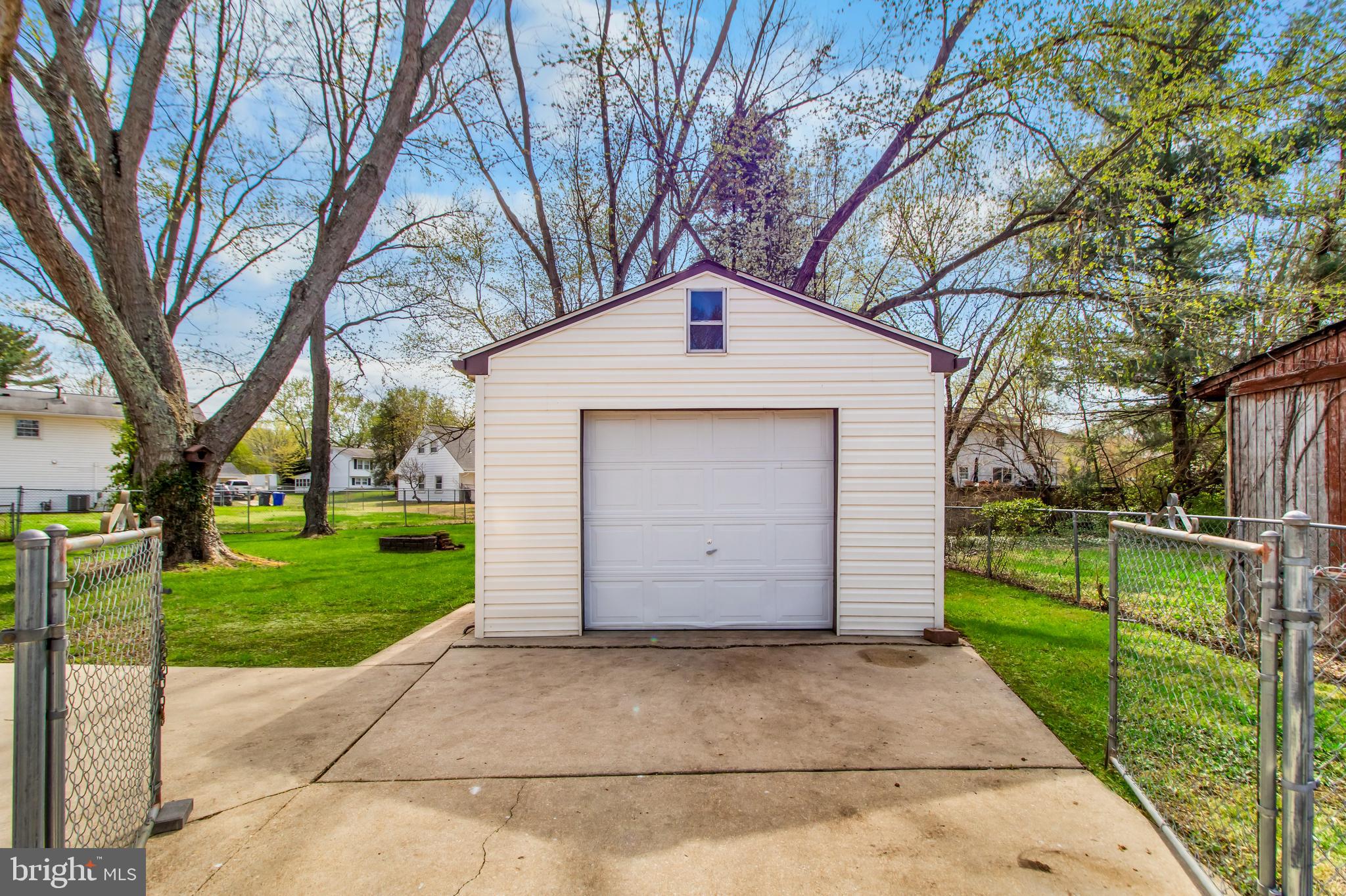 22 Marshall Road Waldorf, MD 20602 - Photo 35 of 41 a front view of a house with a garden and trees
