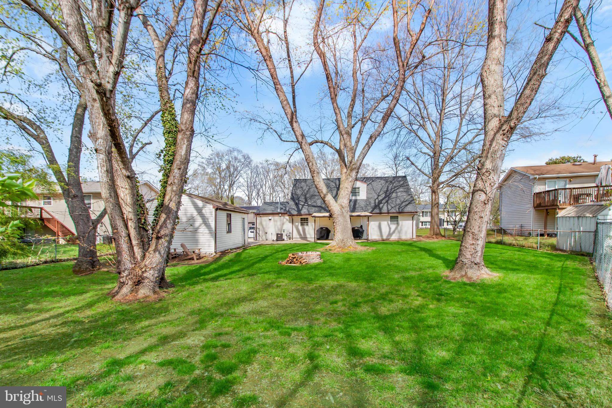 22 Marshall Road Waldorf, MD 20602 - Photo 38 of 41 a garden with trees in front of it