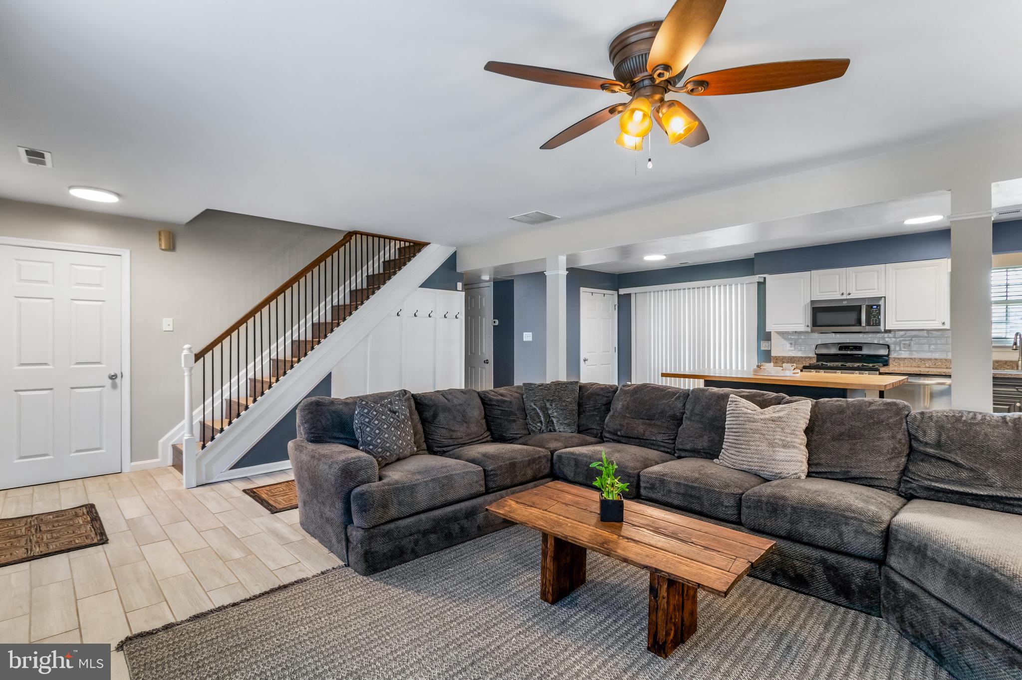 22 Marshall Road Waldorf, MD 20602 - Photo 8 of 38 a living room with furniture and a ceiling fan