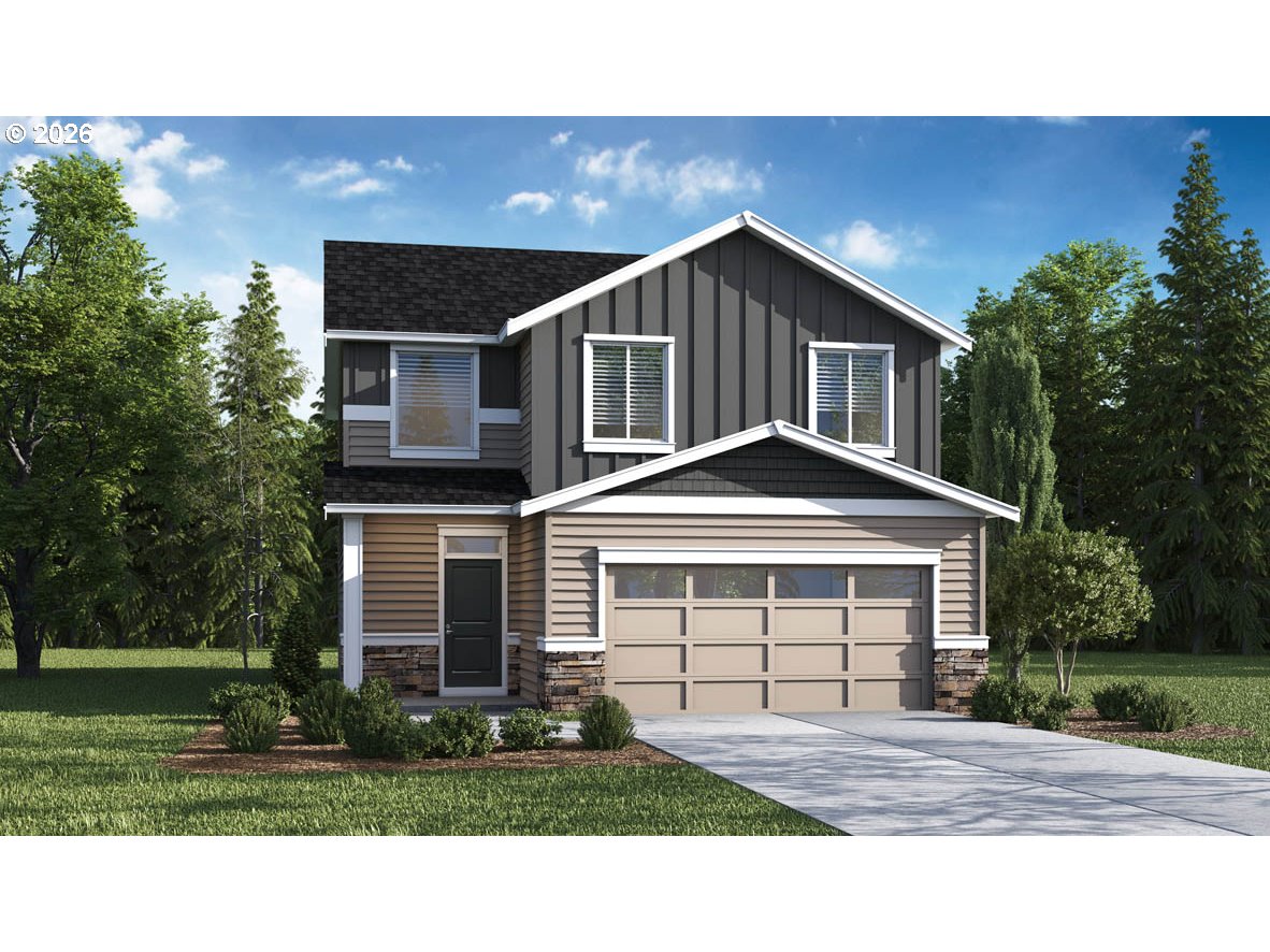9463 Southeast Crystal Rose Street Happy Valley, OR 97086 - Photo 1 of 27 a front view of a house with a yard