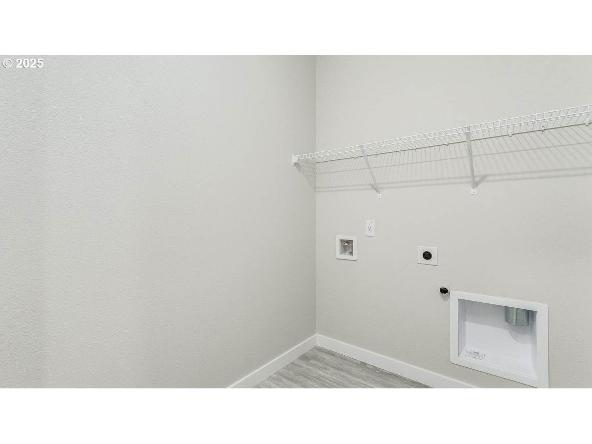 9463 Southeast Crystal Rose Street Happy Valley, OR 97086 - Photo 20 of 27 a black and white photo of a small space