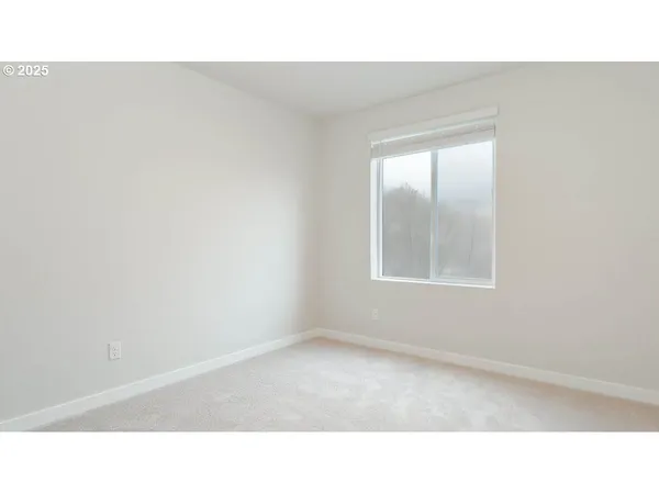 a black and white photo of a living room