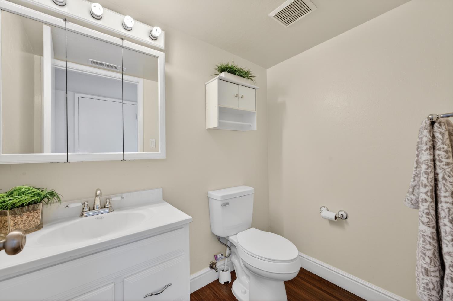 6146 Shadow Lane Citrus Heights, CA 95621 - Photo 15 of 45 a bathroom with a sink toilet and vanity