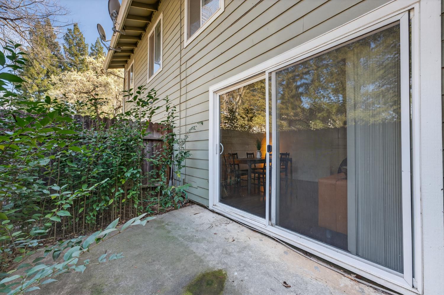 6146 Shadow Lane Citrus Heights, CA 95621 - Photo 27 of 45 a view of a glass door with a tree