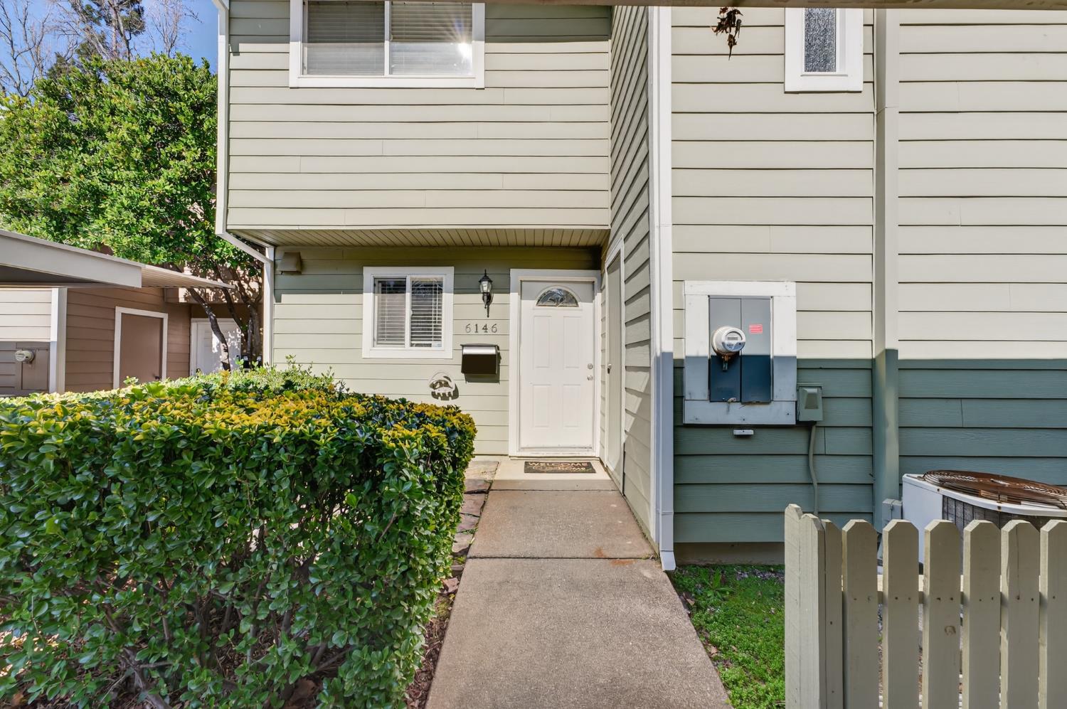 6146 Shadow Lane Citrus Heights, CA 95621 - Photo 3 of 45 a front view of a house with a garden