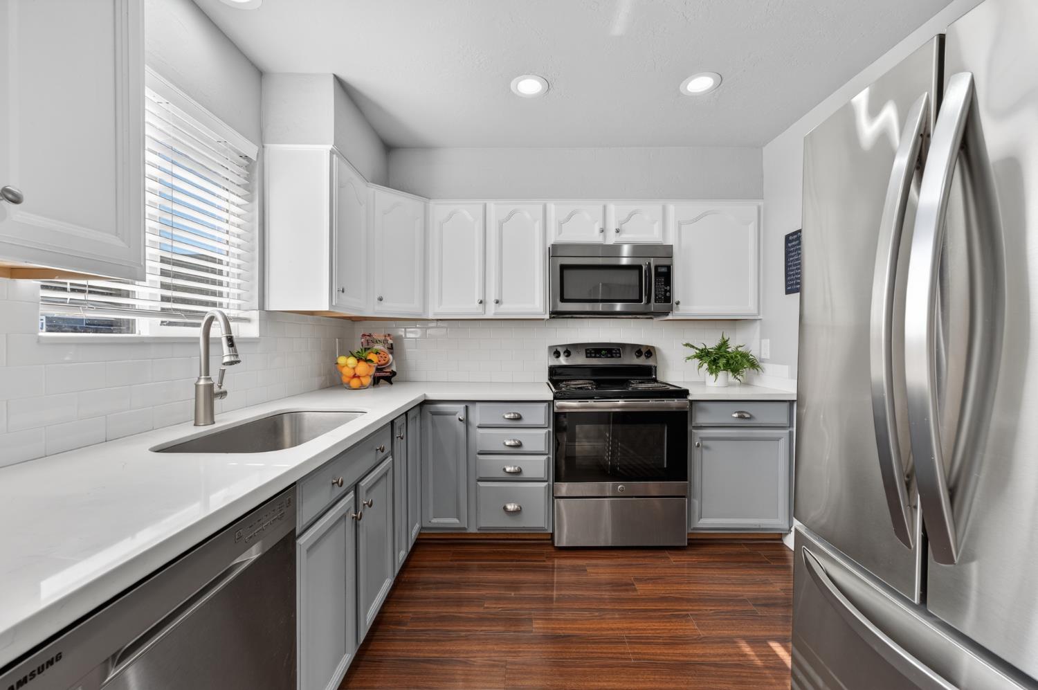 6146 Shadow Lane Citrus Heights, CA 95621 - Photo 5 of 45 a kitchen with stainless steel appliances a refrigerator sink and stove