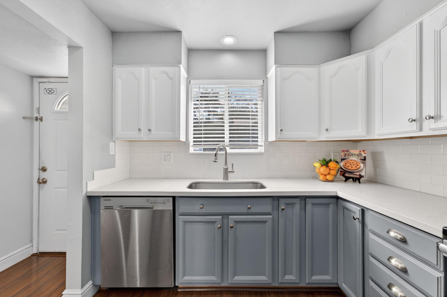 6146 Shadow Lane Citrus Heights, CA 95621 - Photo 6 of 45 a kitchen with a sink cabinets and window