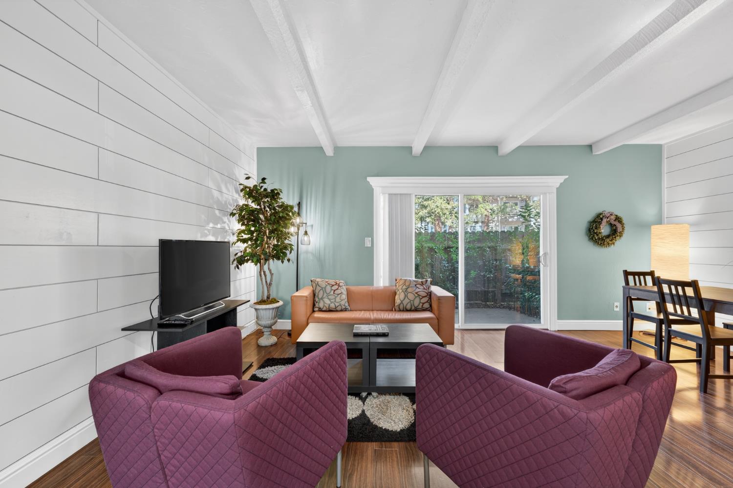 6146 Shadow Lane Citrus Heights, CA 95621 - Photo 10 of 45 a living room with furniture floor to ceiling window and a flat screen tv