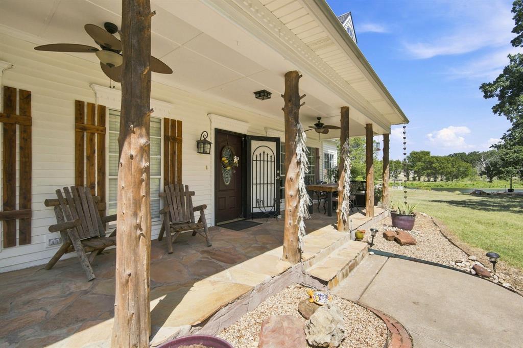 Stunning front porch to enjoy morning coffee