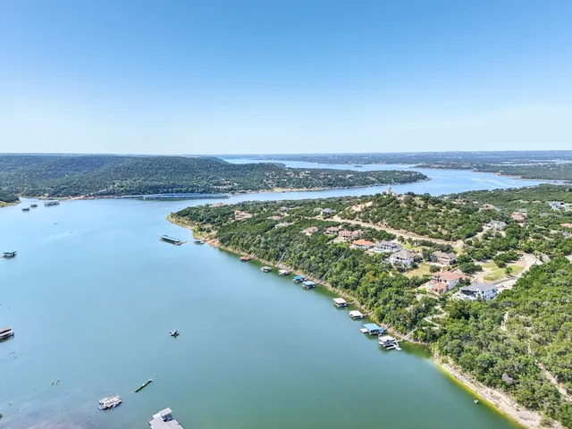a view of a lake with a city