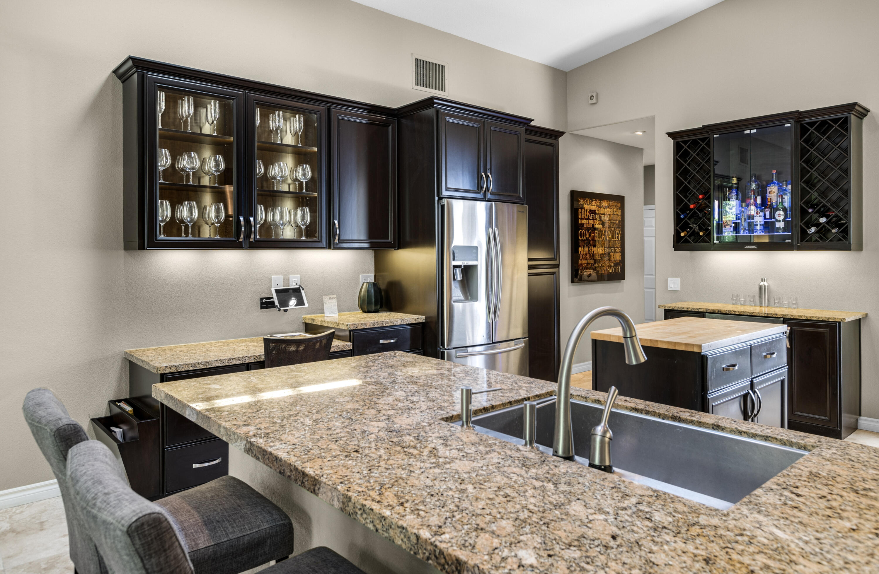 68590 Risueno Road Cathedral City, CA 92234 - Photo 11 of 72 a kitchen with stainless steel appliances granite countertop a sink stove and refrigerator