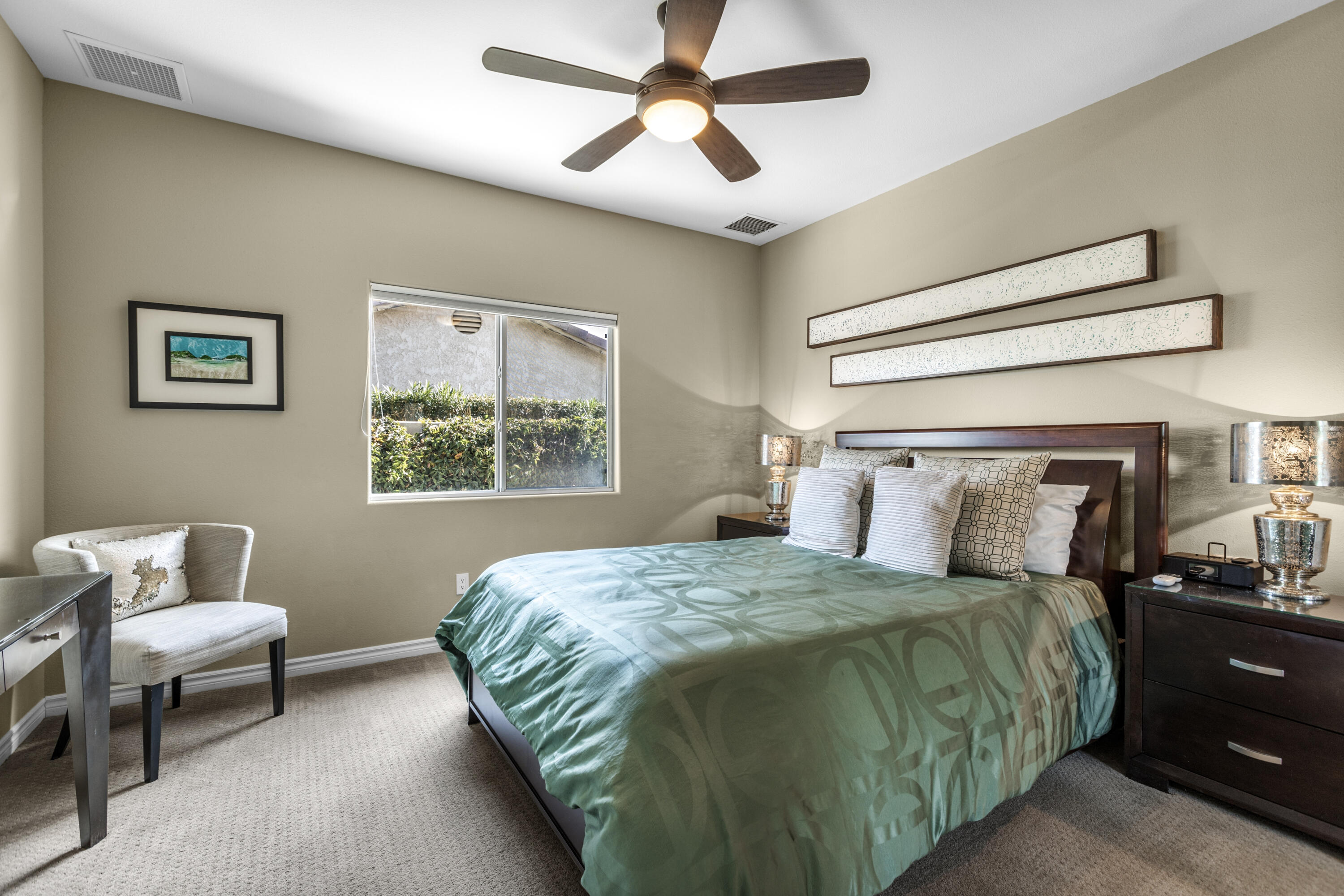 68590 Risueno Road Cathedral City, CA 92234 - Photo 25 of 72 a bedroom with a bed and window