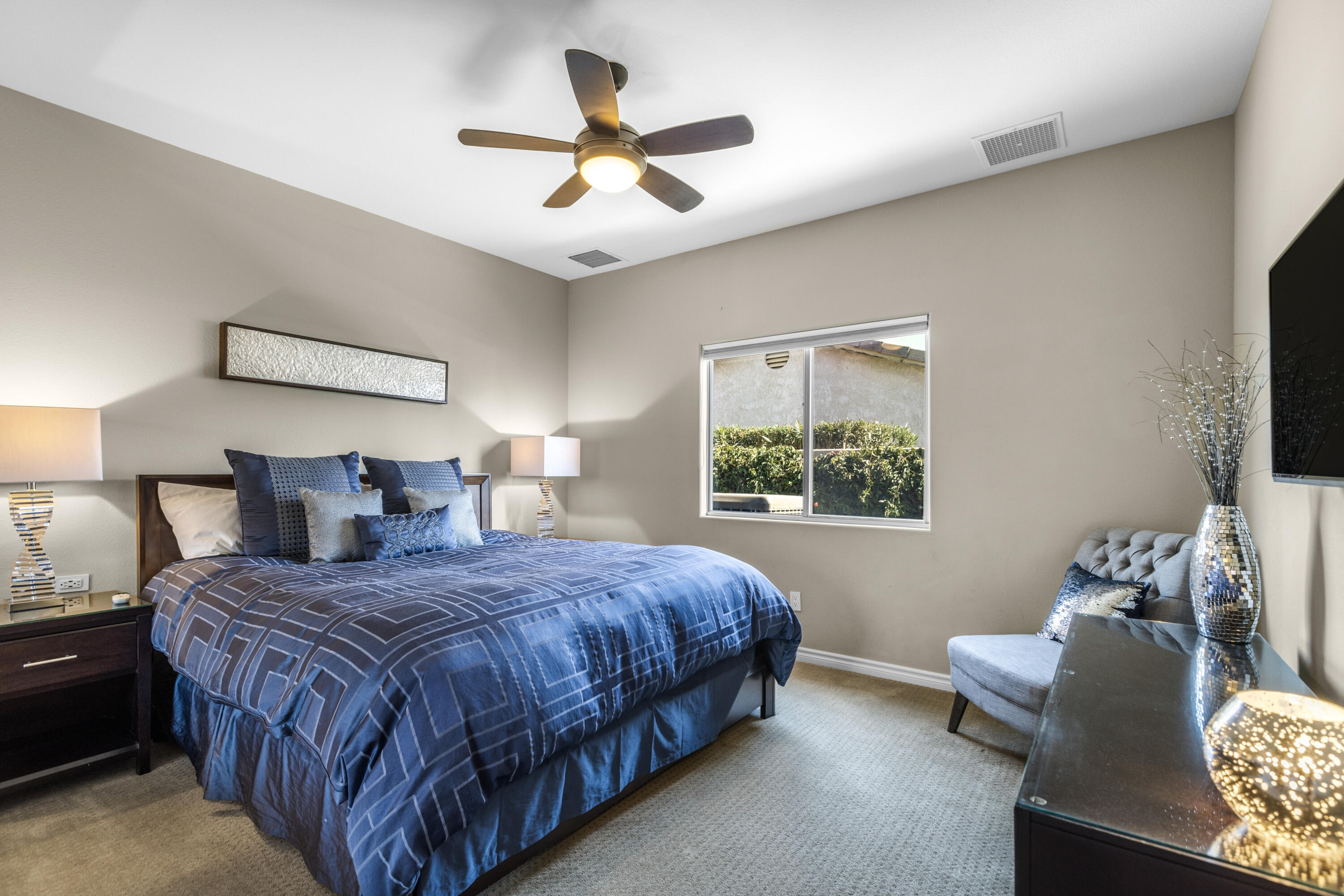 68590 Risueno Road Cathedral City, CA 92234 - Photo 29 of 72 a bedroom with a bed and a window