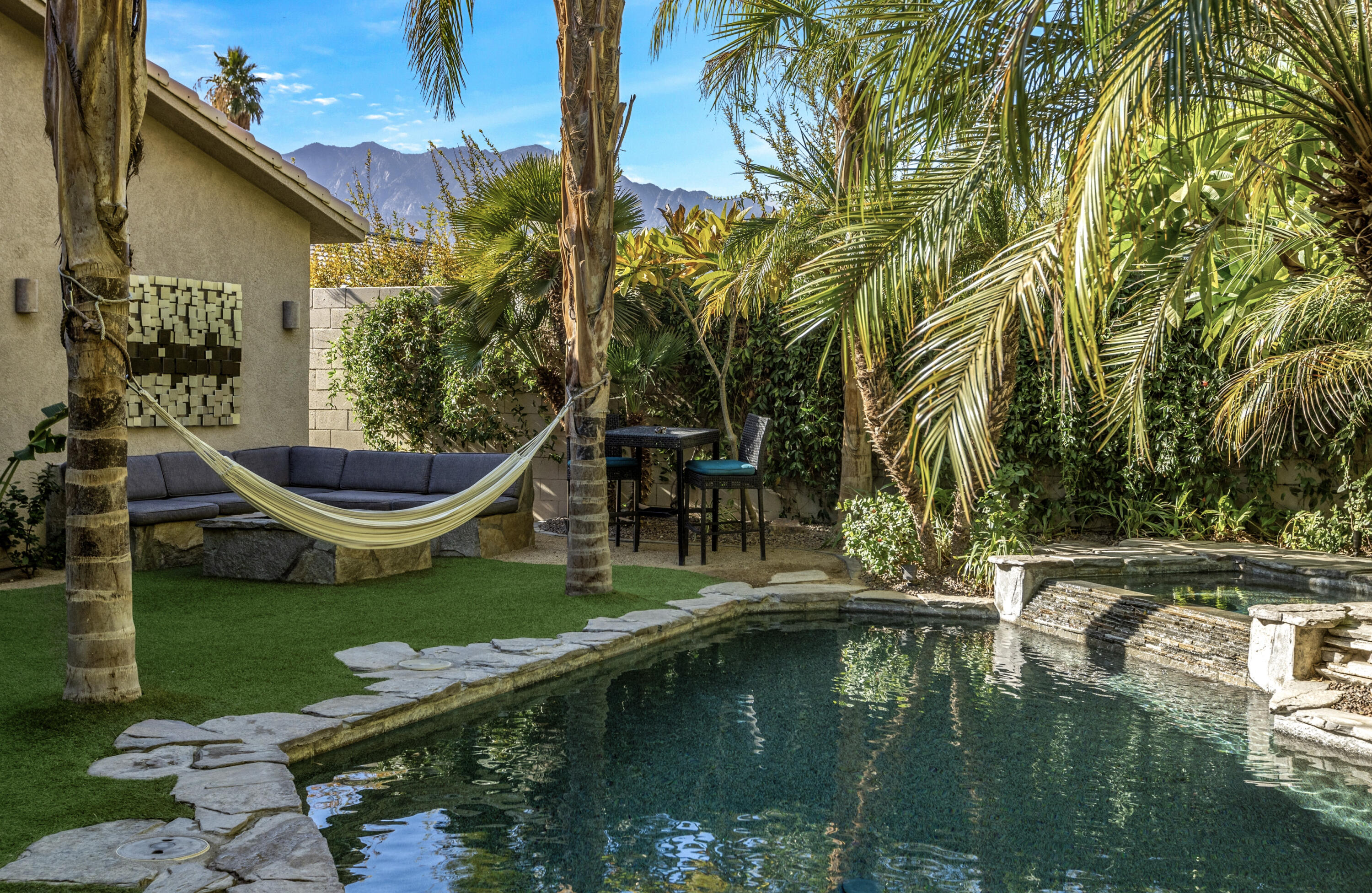 68590 Risueno Road Cathedral City, CA 92234 - Photo 51 of 72 a view of a house with swimming pool and sitting area