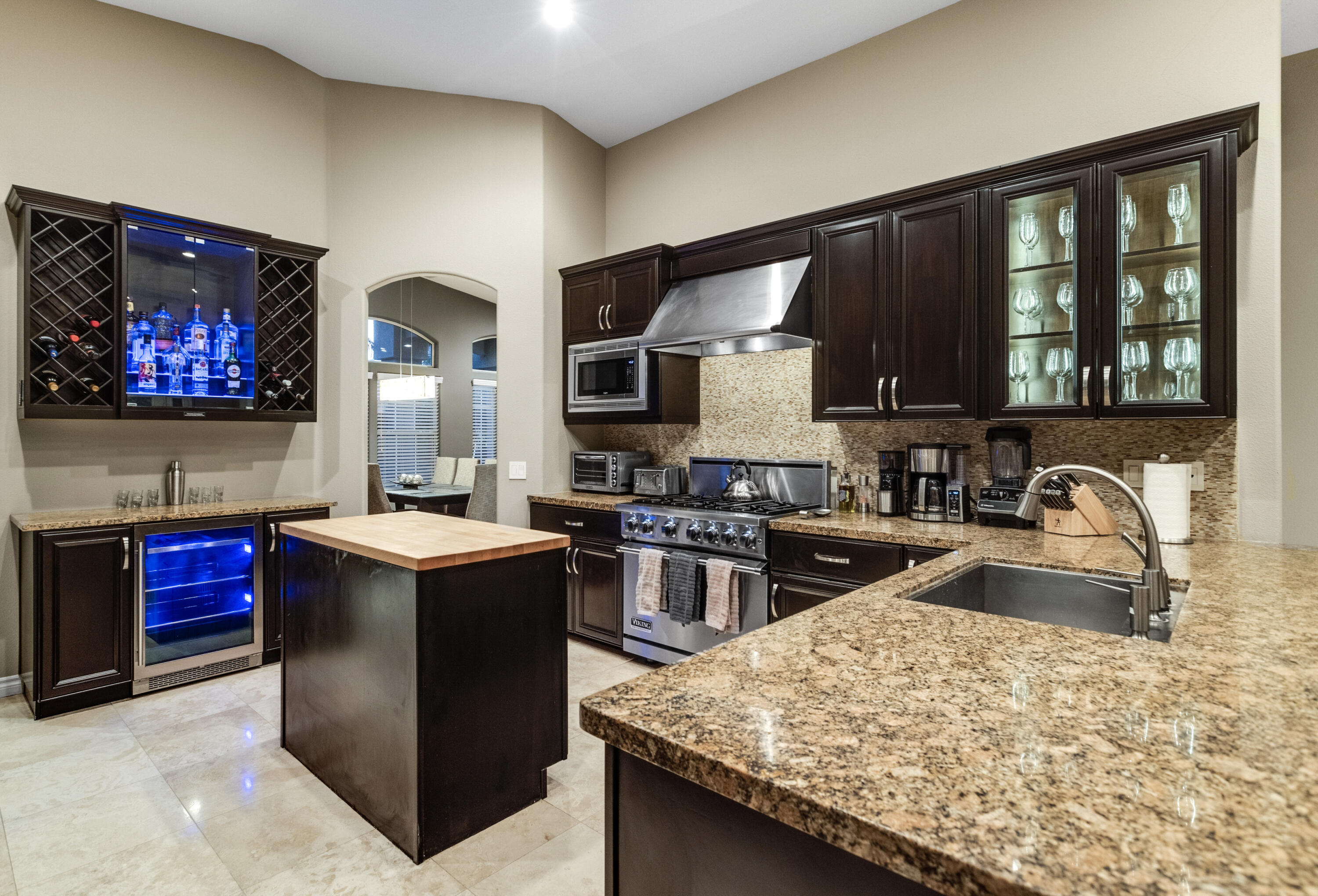 68590 Risueno Road Cathedral City, CA 92234 - Photo 58 of 72 a kitchen with a stove and a sink