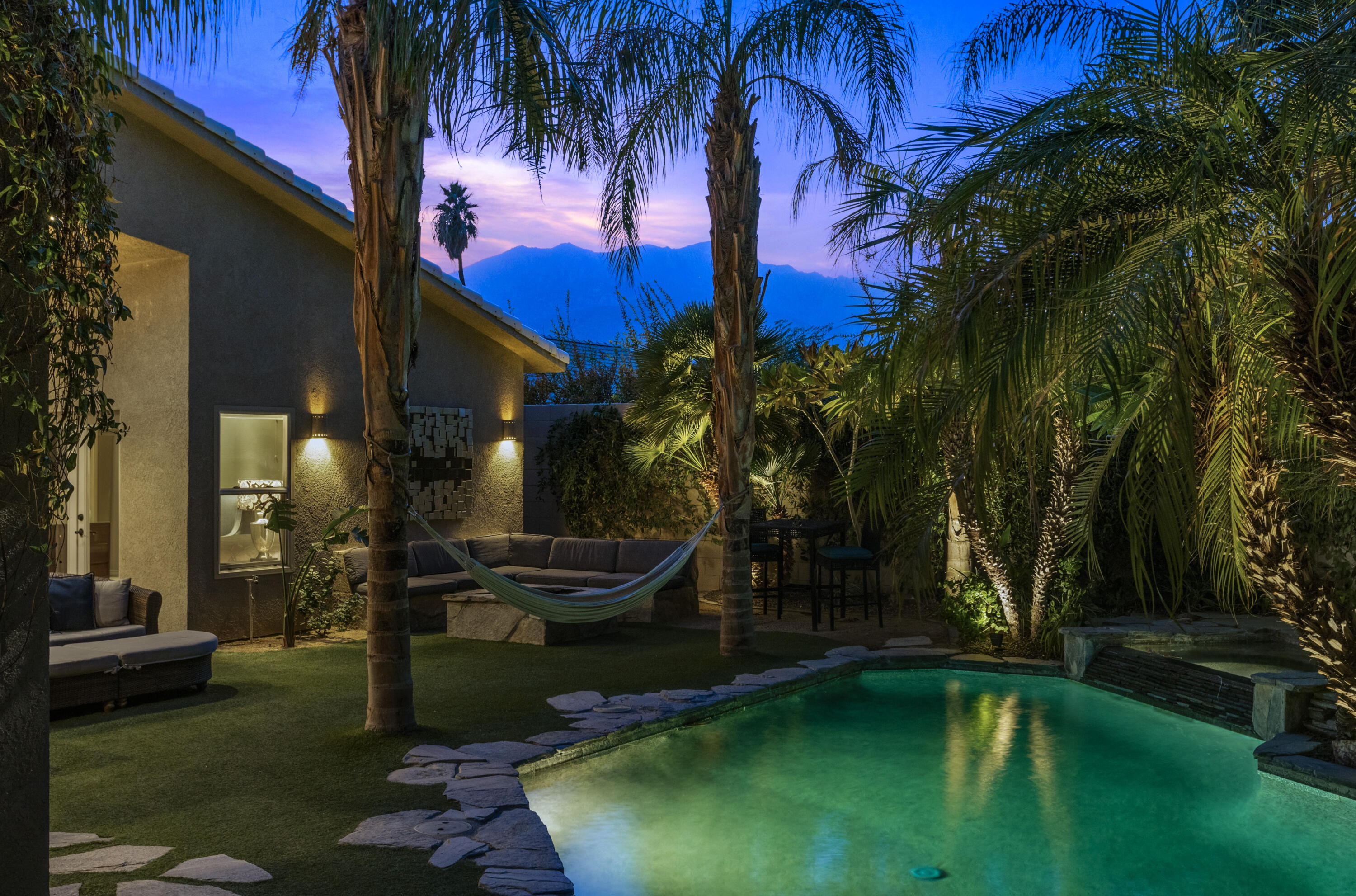 68590 Risueno Road Cathedral City, CA 92234 - Photo 72 of 72 a view of a swimming pool with a garden