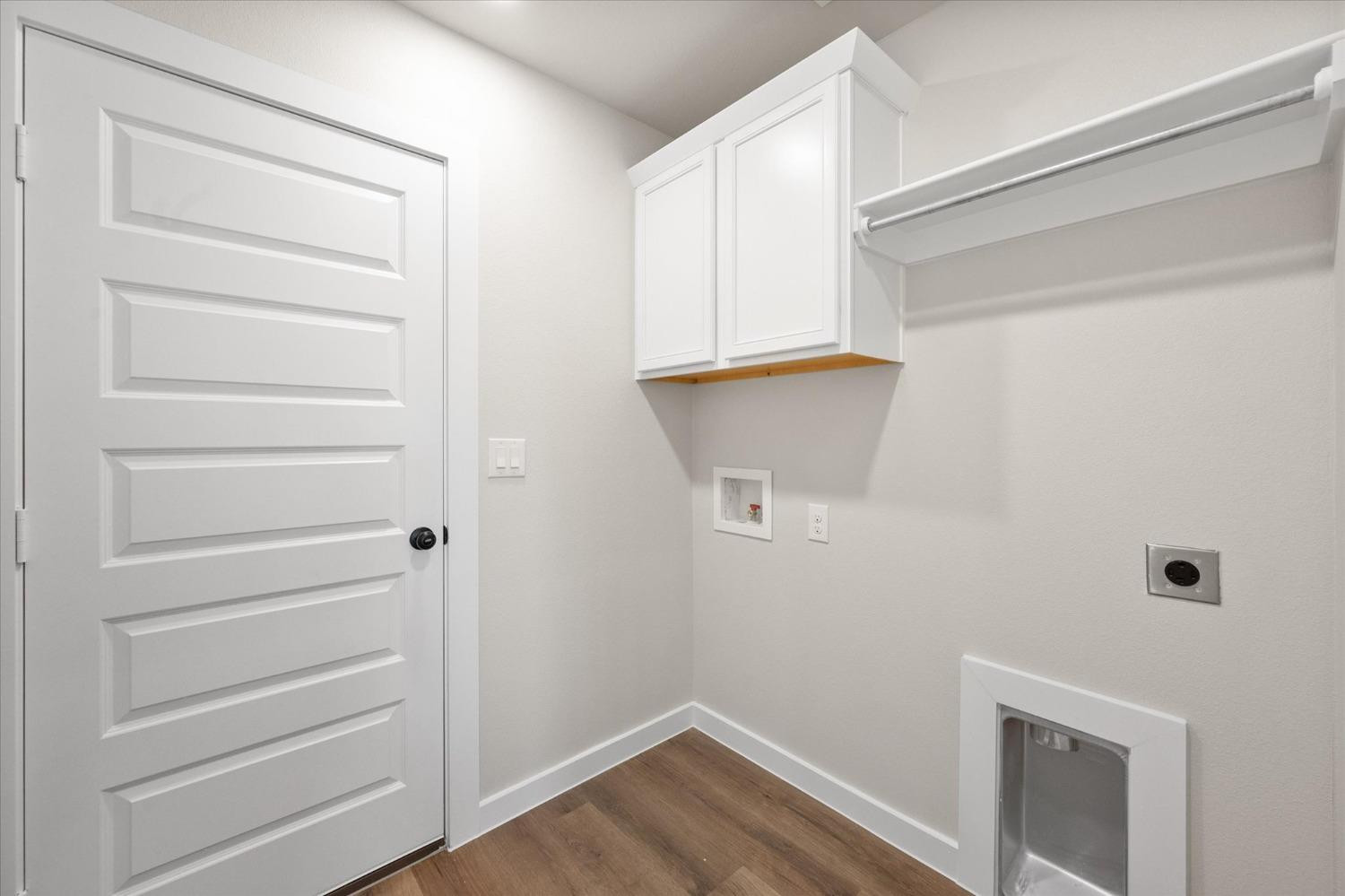 6917 55th Street Lubbock, TX 79407 - Photo 19 of 20 a view of walk in closet with empty racks