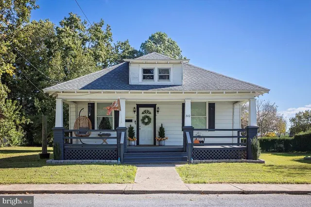 a view of a house with a swimming pool