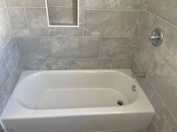 a bathroom with a bathtub