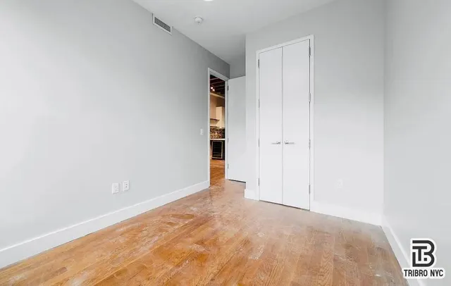 an empty room with an entryway