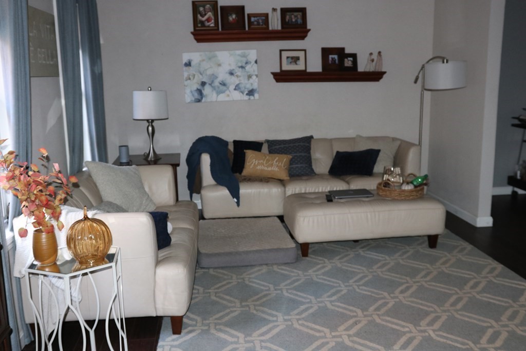 28 South Meadow Road Clinton, MA 01510 - Photo 16 of 24 a living room with furniture and wooden floor