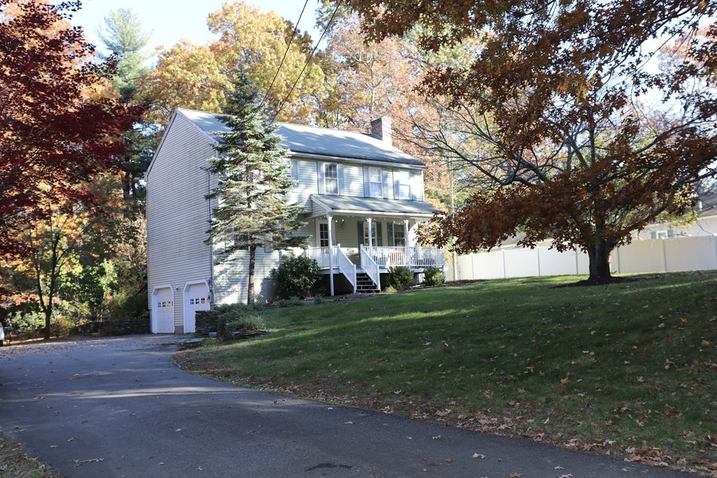 28 South Meadow Road Clinton, MA 01510 - Photo 2 of 24 a view of a house next to a big yard and large trees