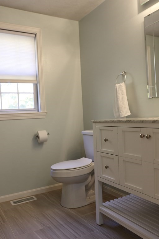 28 South Meadow Road Clinton, MA 01510 - Photo 21 of 24 a bathroom with a toilet and a sink