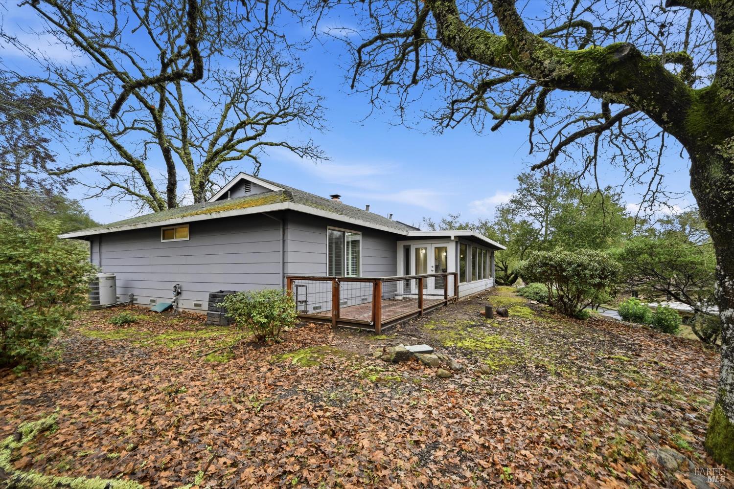 6480 Meadowridge Drive Santa Rosa, CA 95409 - Photo 24 of 26 a house that has a tree in front of it