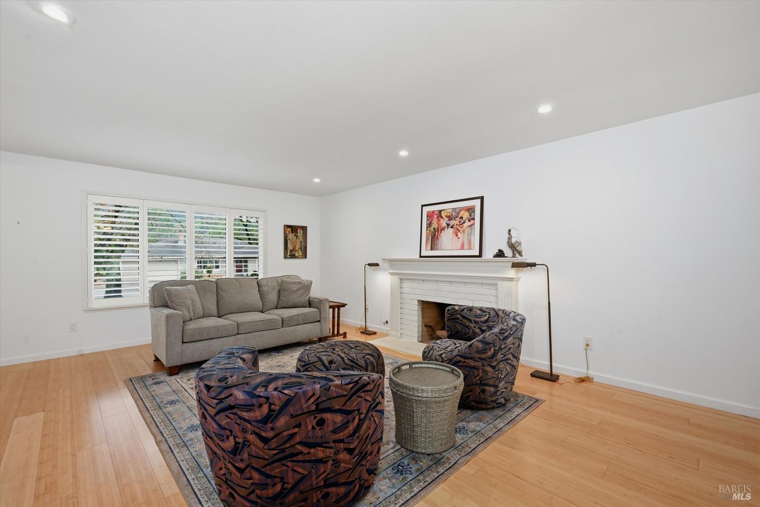 6480 Meadowridge Drive Santa Rosa, CA 95409 - Photo 6 of 26 a living room with furniture and a fireplace
