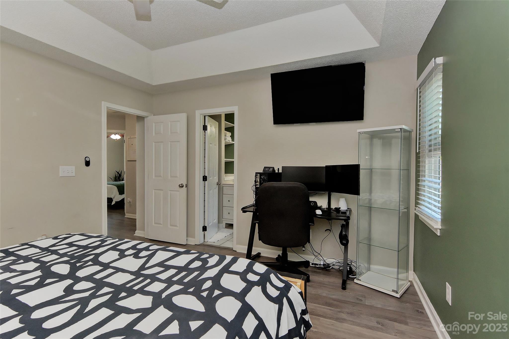 1016 Ridgefield Circle Indian Trail, NC 28079 - Photo 10 of 19 a view of a livingroom with furniture and a flat screen tv
