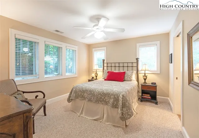 a bedroom with a bed and furniture