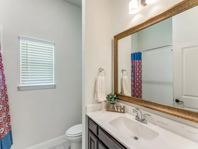 a view of a bedroom with closet area