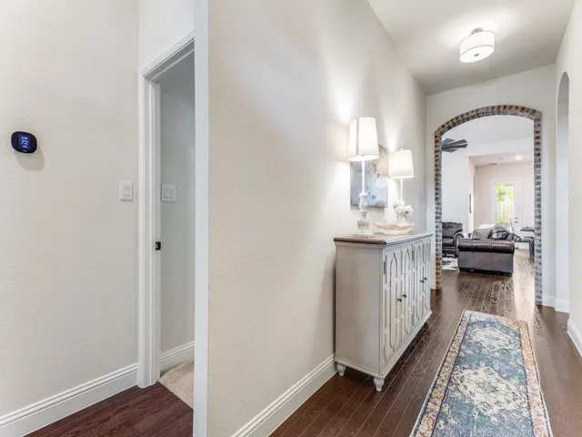 a en suite bathroom with a sink and a mirror