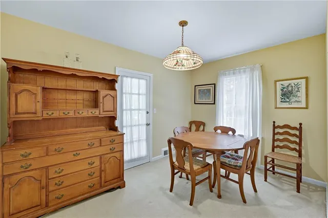 a view of a room with yard and balcony