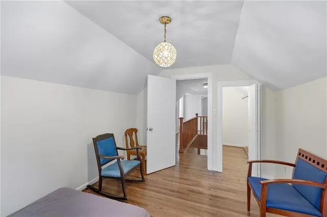 a bathroom with a toilet a sink and shower