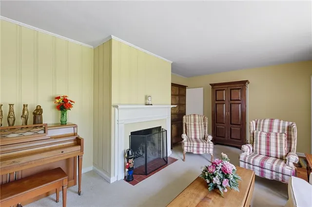 a living room with furniture and a table