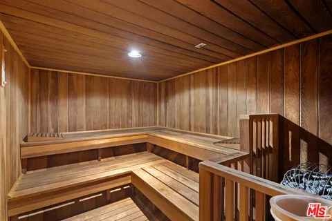 a view of swimming pool with outdoor seating