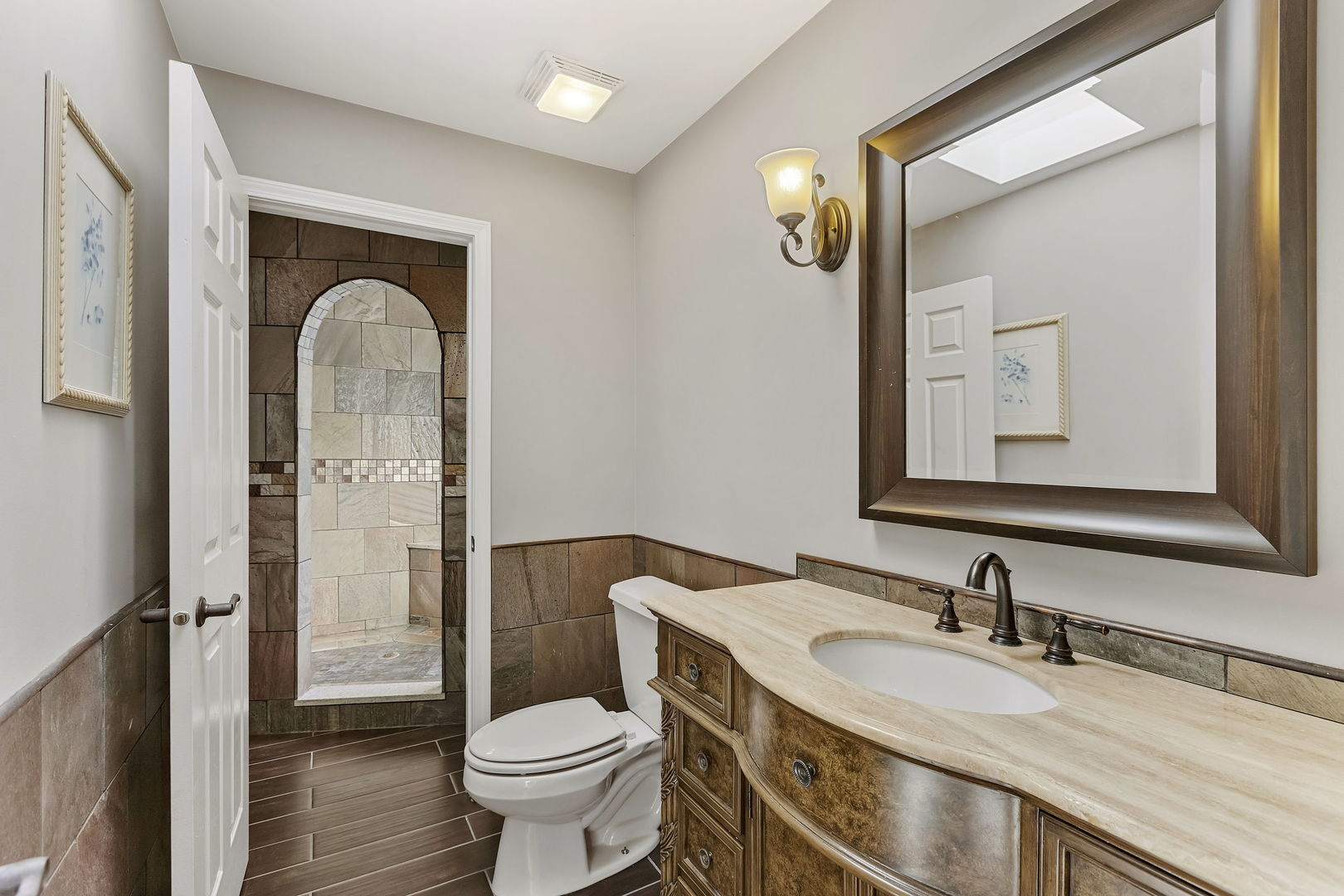 5N259 Wilton Croft Road St. Charles, IL 60175 - Photo 23 of 48 a bathroom with a granite countertop sink mirror vanity and toilet
