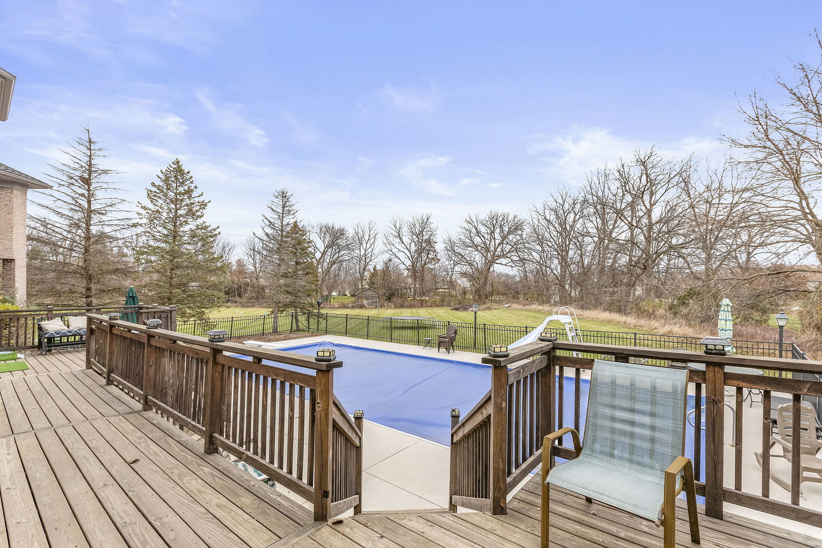 5N259 Wilton Croft Road St. Charles, IL 60175 - Photo 40 of 48 a view of a deck with couches and wooden floor