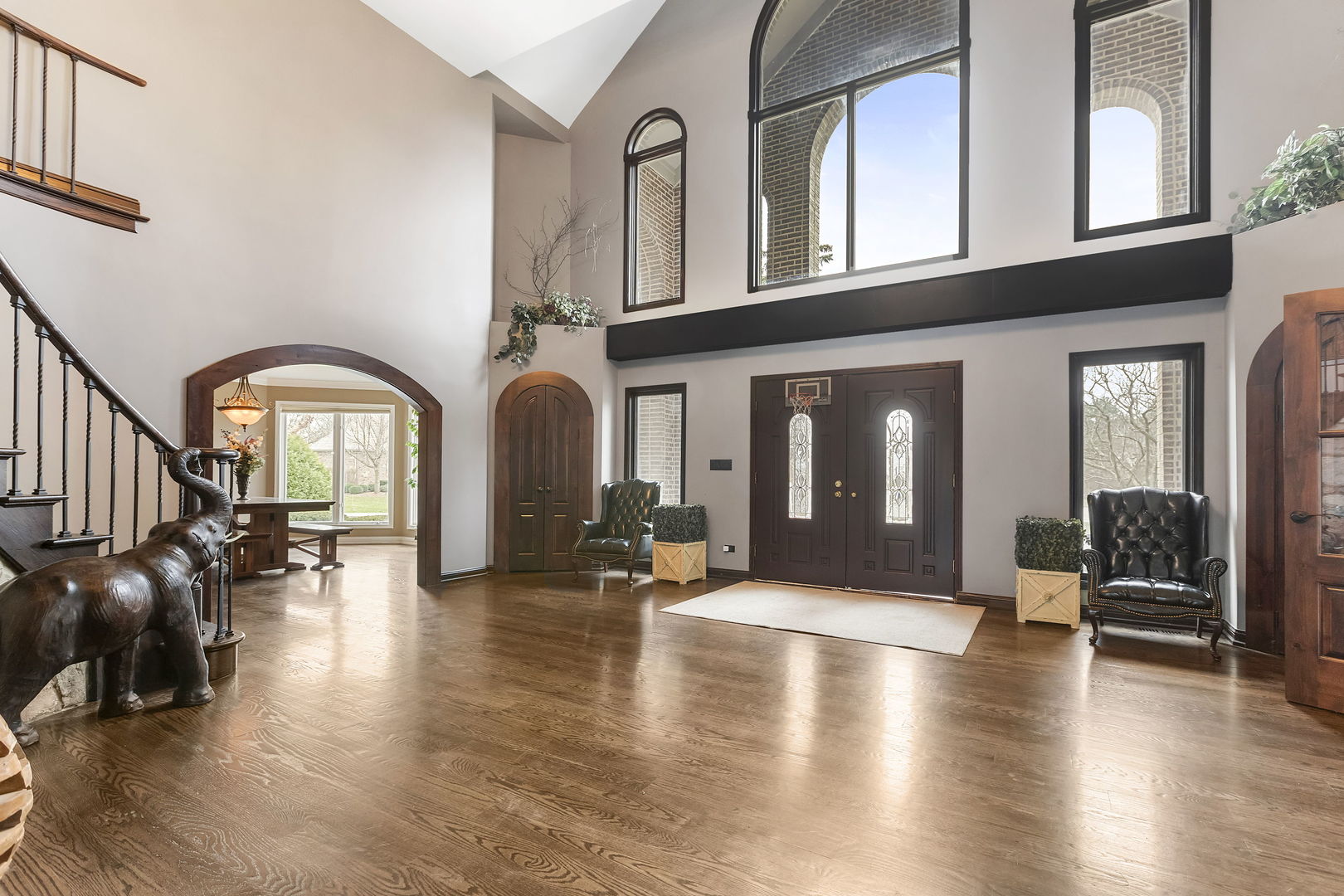 5N259 Wilton Croft Road St. Charles, IL 60175 - Photo 4 of 48 a view of livingroom with entryway and wooden floor