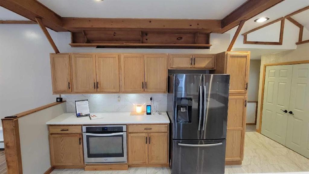 294 Dodds Road Butler, PA 16002 - Photo 5 of 28 a kitchen with stainless steel appliances granite countertop a refrigerator and a stove