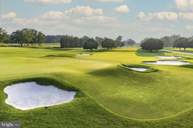 a view of a swimming pool with an ocean
