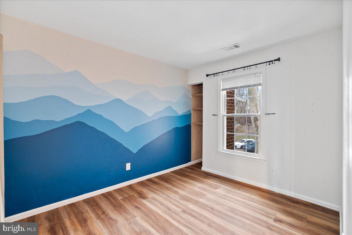 11146 Beaver Trail Court Reston, VA 20191 - Photo 10 of 17 a view of an empty room with a window