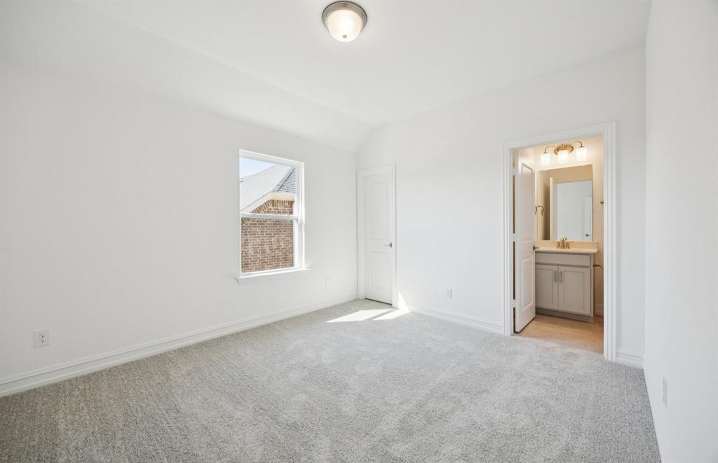 3048 Cliffside Drive Celina, TX 75009 - Photo 12 of 14 an empty room with a bathroom and a window
