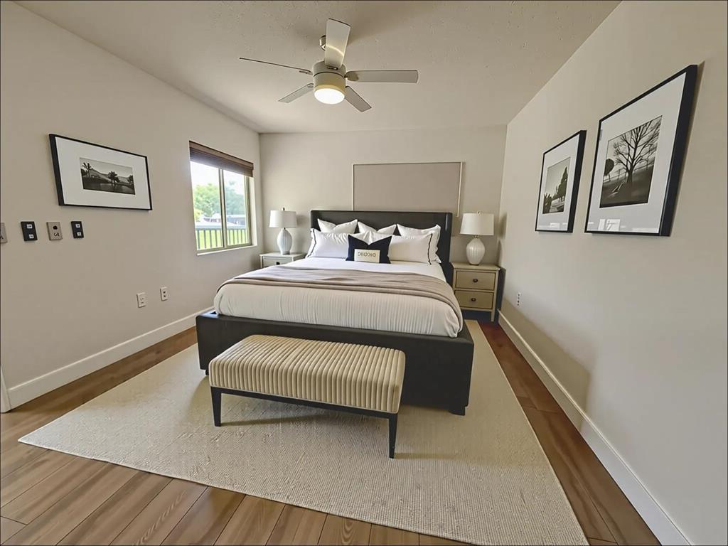 1650 Southwest 124th Terrace, Unit 209D Pembroke Pines, FL 33027 - Photo 2 of 19 a bedroom with a bed and a window