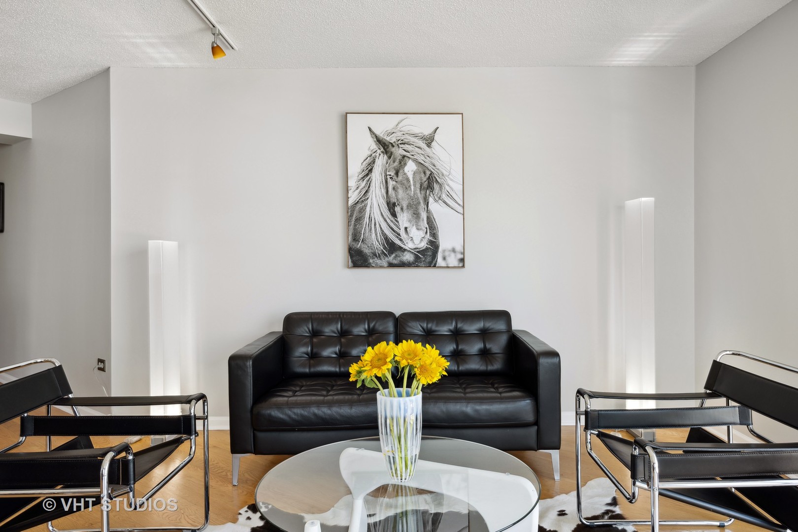 1720 Maple Avenue, Unit 1040 Evanston, IL 60201 - Photo 2 of 35 a living room with furniture flowerpot and a piano