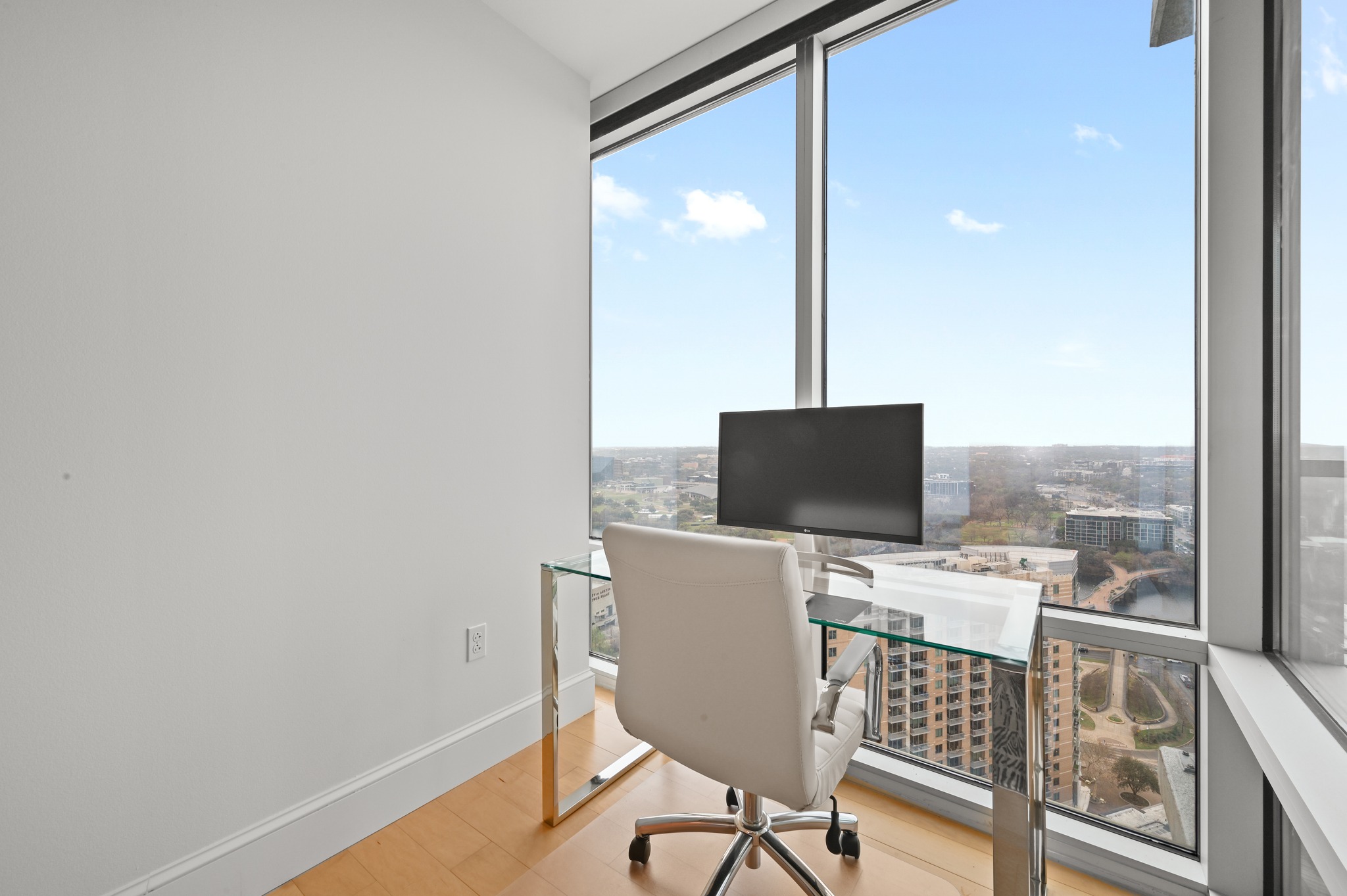 300 Bowie Street, Unit 2902 Austin, TX 78703 - Photo 12 of 40 a view of a workspace with furniture