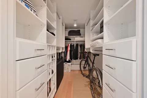 a view of a storage & utility room with washer and dryer