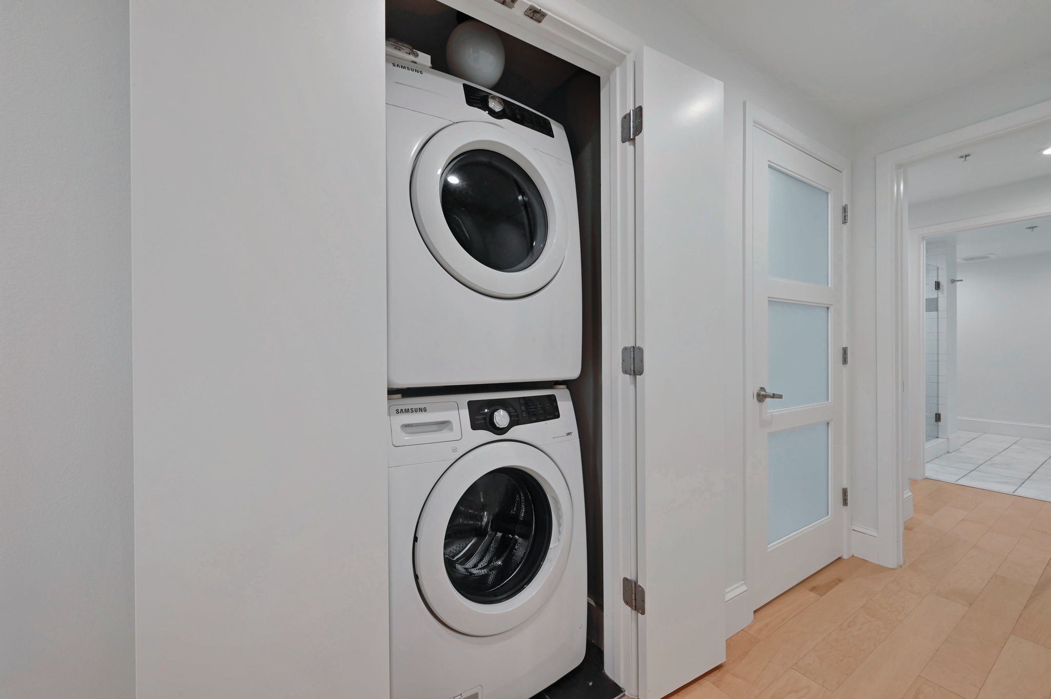 300 Bowie Street, Unit 2902 Austin, TX 78703 - Photo 22 of 40 a utility room with dryer and washer