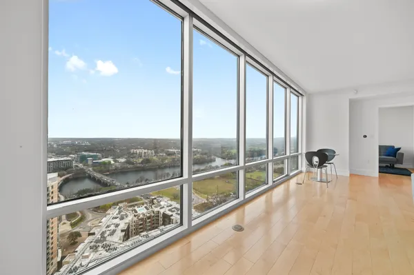 a view of roof deck with furniture